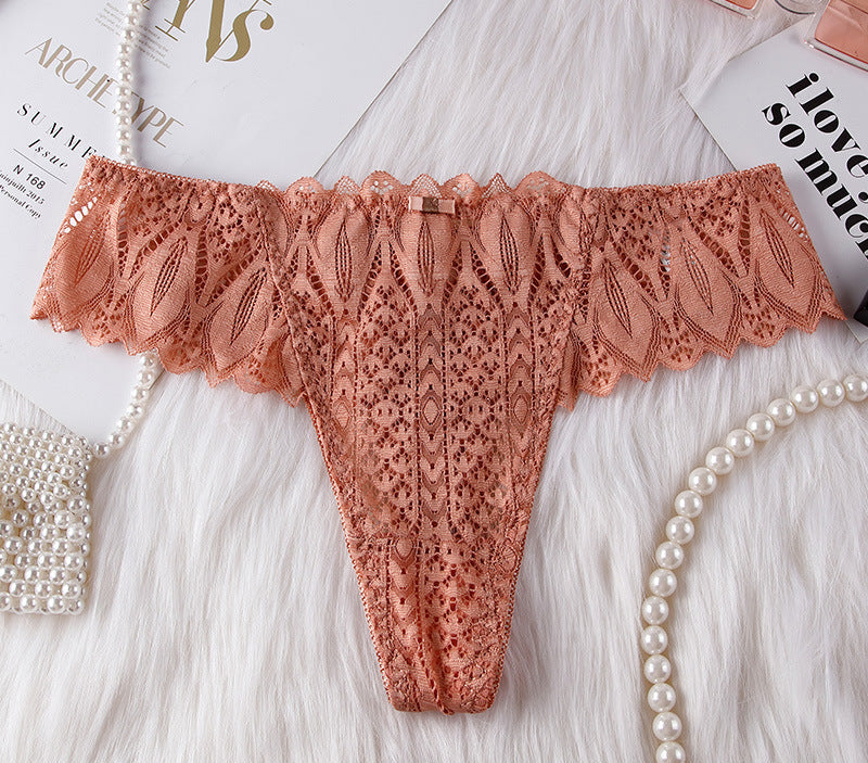 Sexy lace low-rise T-pants thong women's breathable belt hollow and seamless temptation transparent underwear women's new models